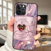 Phone case with 'In Loving Memory' design held by a person in a living room.